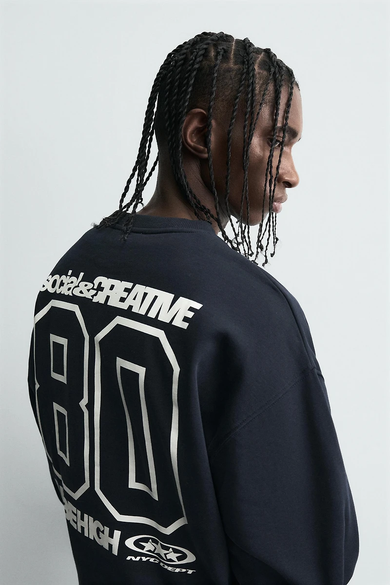 COMBINATION PRINT SWEATSHIRT