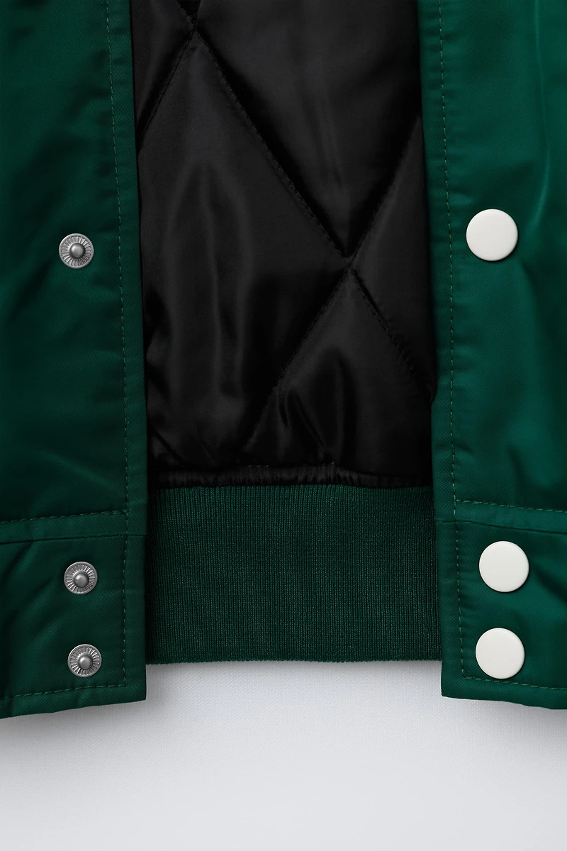 BOMBER JACKET WITH REMOVABLE TEXT HOODIE