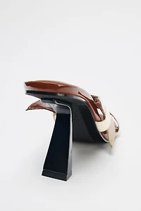 ASYMMETRIC HEELED SANDALS