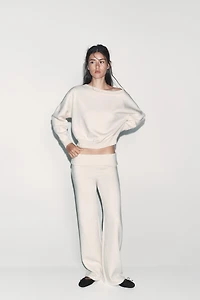 ASYMMETRIC PLUSH SWEATSHIRT