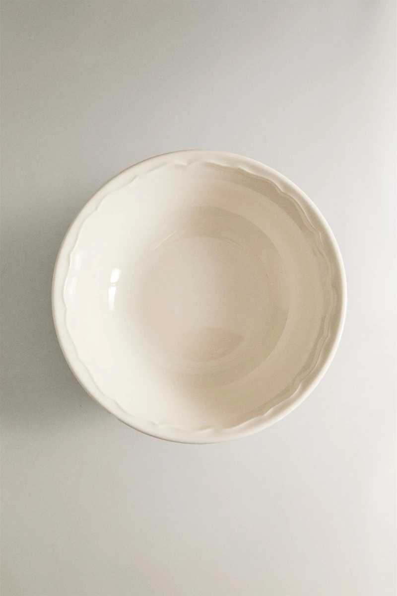 EARTHENWARE BOWL WITH RAISED-DESIGN EDGE