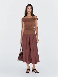 Top drapé avec nœud