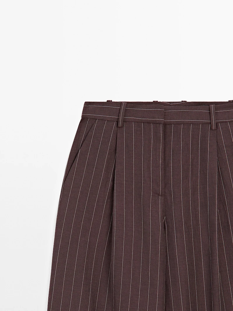 Darted pinstripe trousers