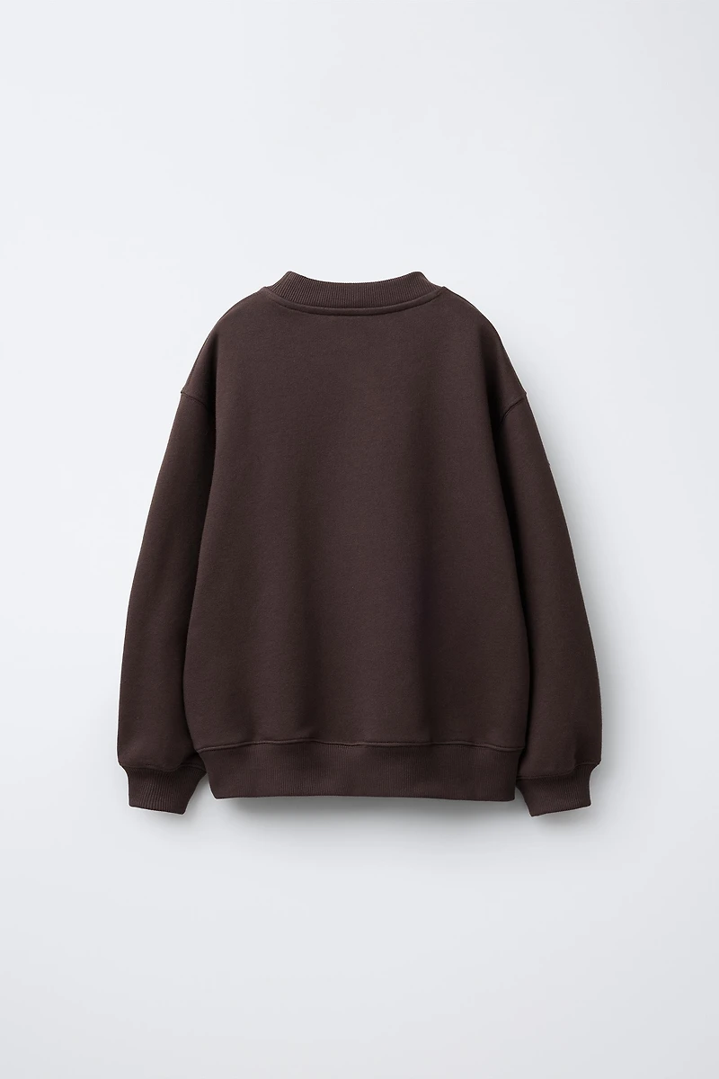 FLOCKED TEXT SWEATSHIRT