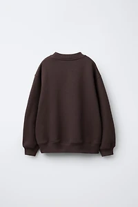 FLOCKED TEXT SWEATSHIRT