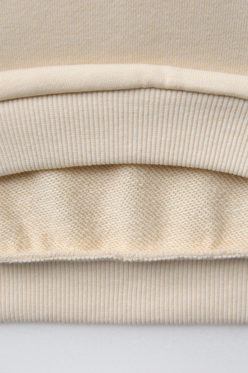 HEART POCKET SWEATSHIRT