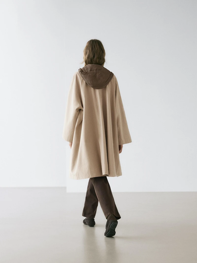 Cape trench coat with hood