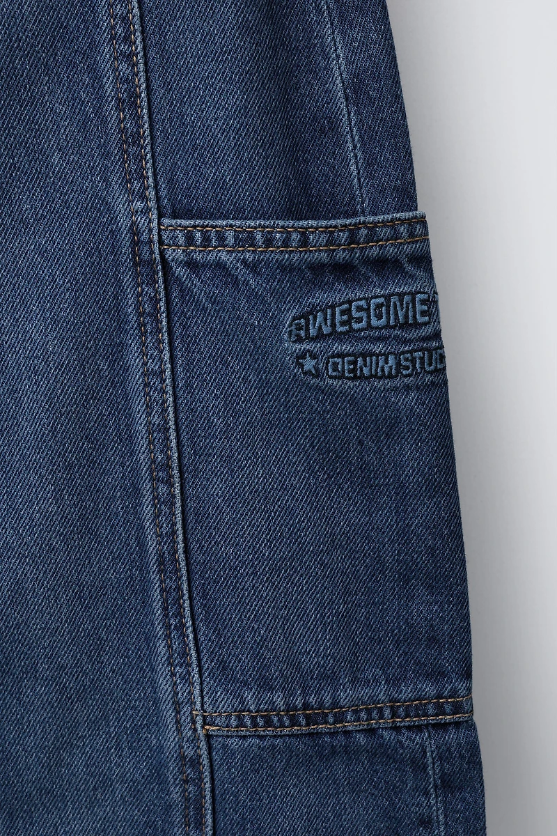EMBROIDERED POCKET BARREL JEANS