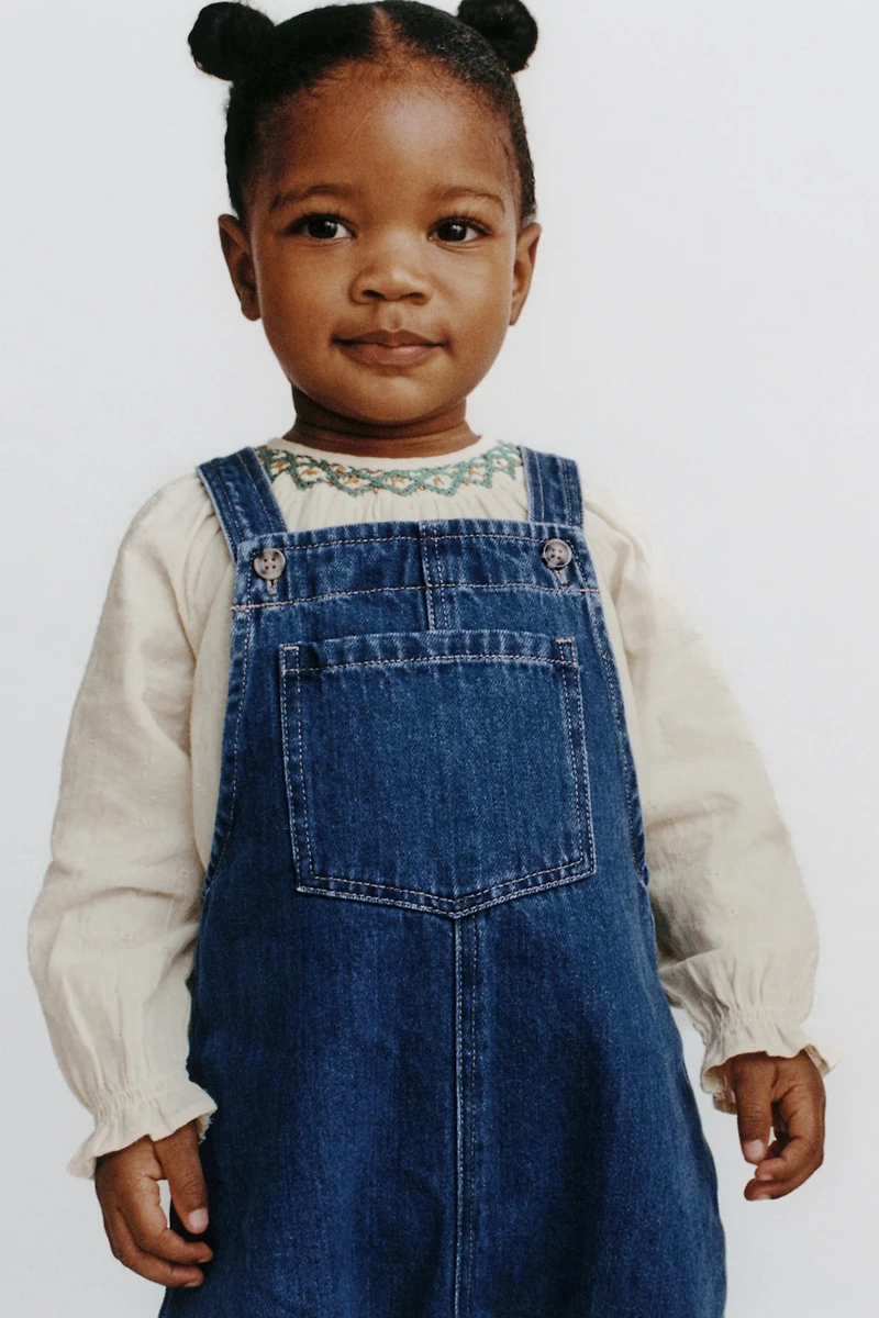 CONTRAST EMBROIDERED BODYSUIT