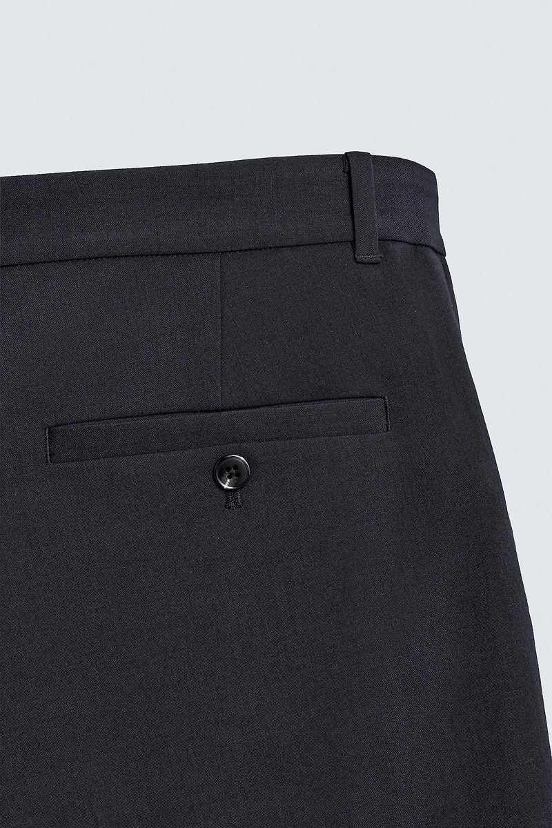 RELAXED FIT PLEATED SUIT SHORTS