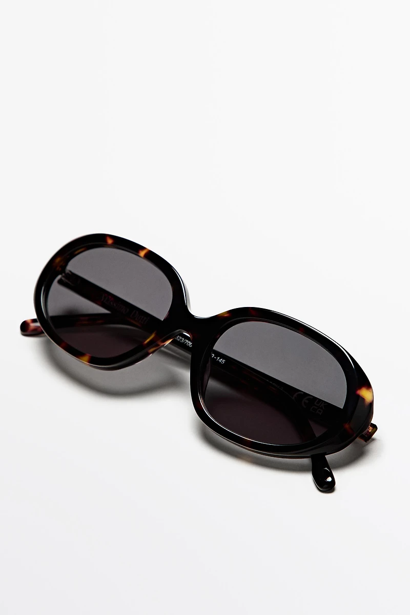 Oval tortoiseshell-effect sunglasses