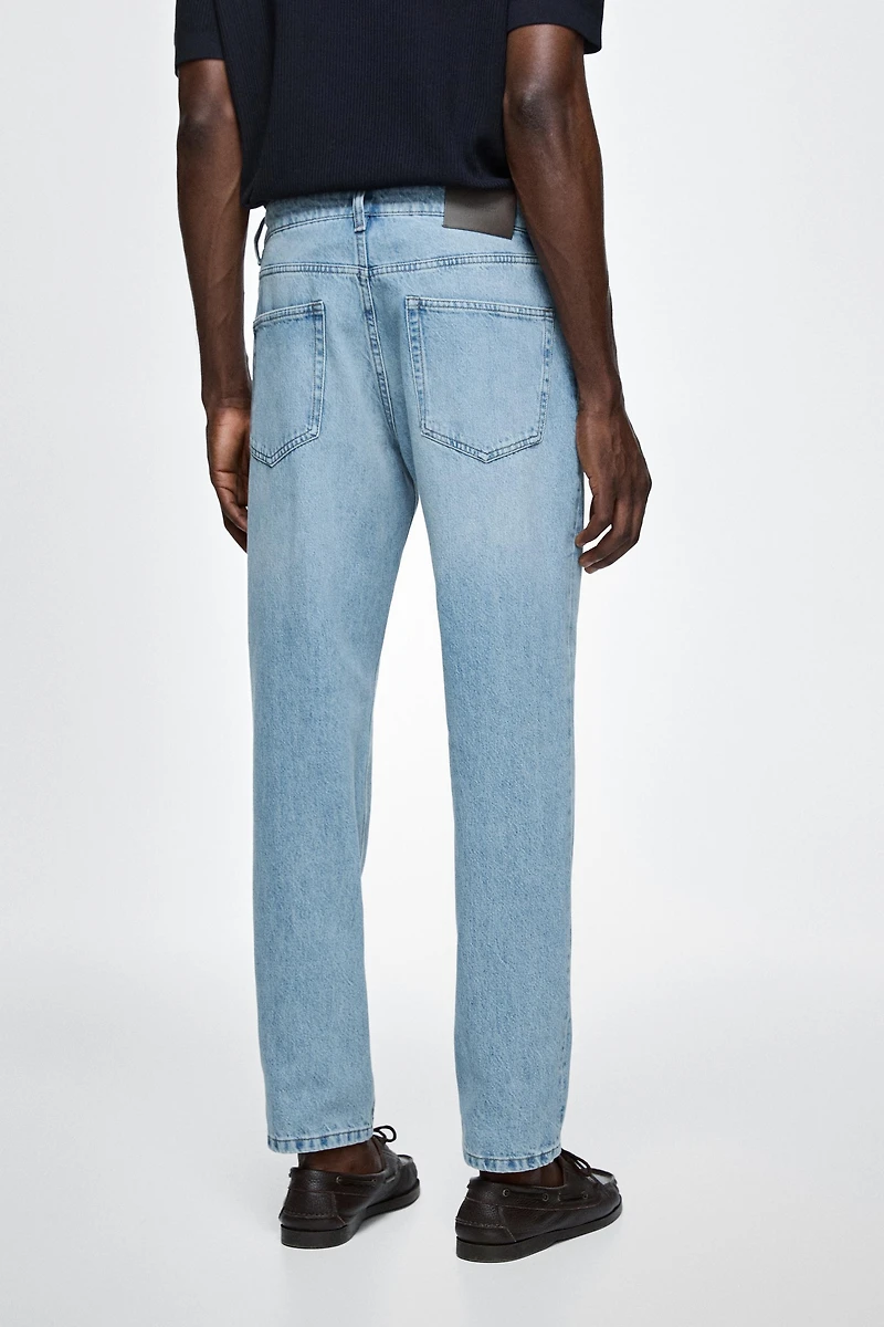 Bleach washed tapered fit jeans