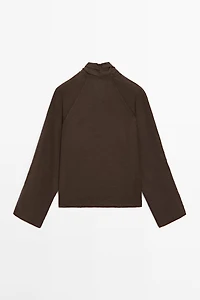 Flowing loose-fitting linen wrap blouse