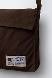 BLOUSON NYLON AVEC SAC CHAMPION ® X ZARA