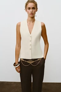 COVERED BUTTON KNIT VEST
