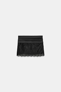 COMBINATION LACE BOW MINI SKIRT