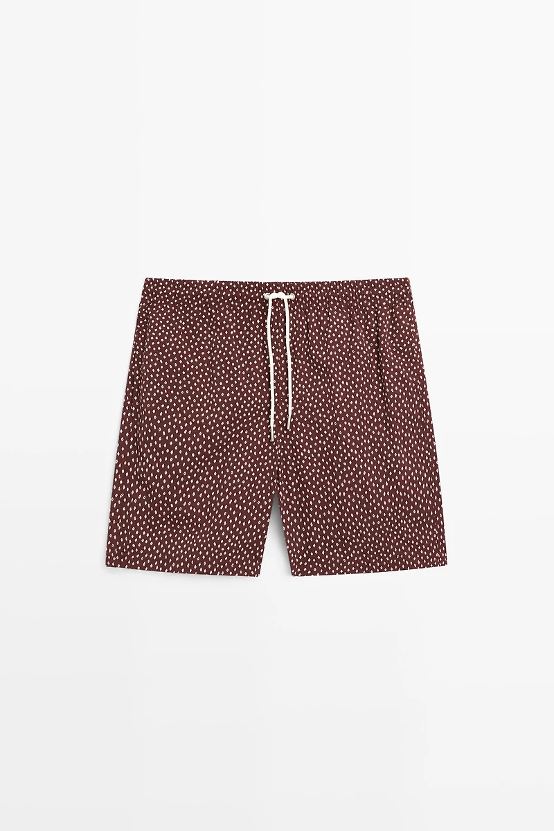 Polka dot print swimming trunks