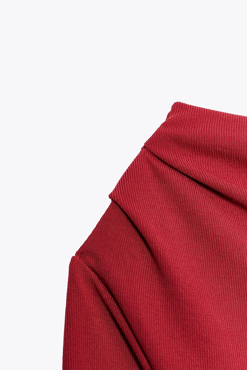 SOFT ASYMMETRIC TOP