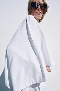 VOLUMINOUS HEAVY COTTON CAPE TOP