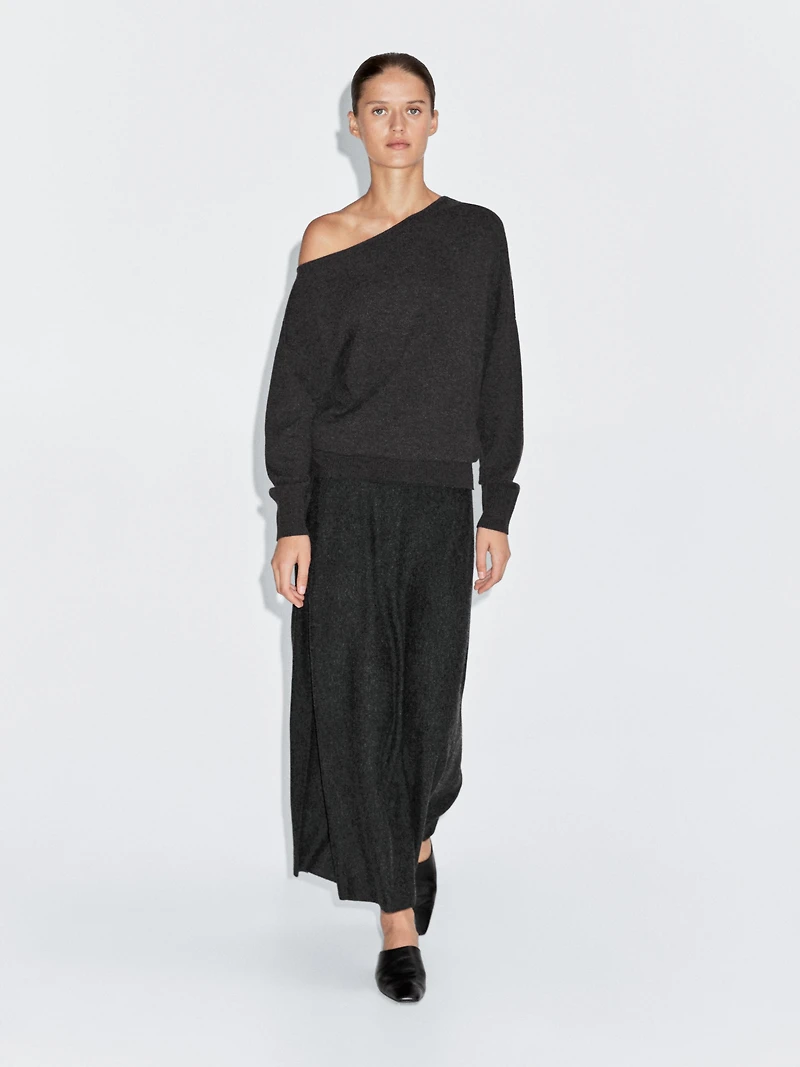 Wool blend knit sweater with asymmetric neckline