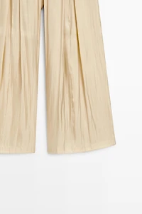 Pantalon fluide en tissu satiné
