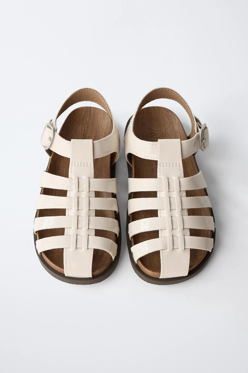 STUDDED FISHERMAN SANDALS