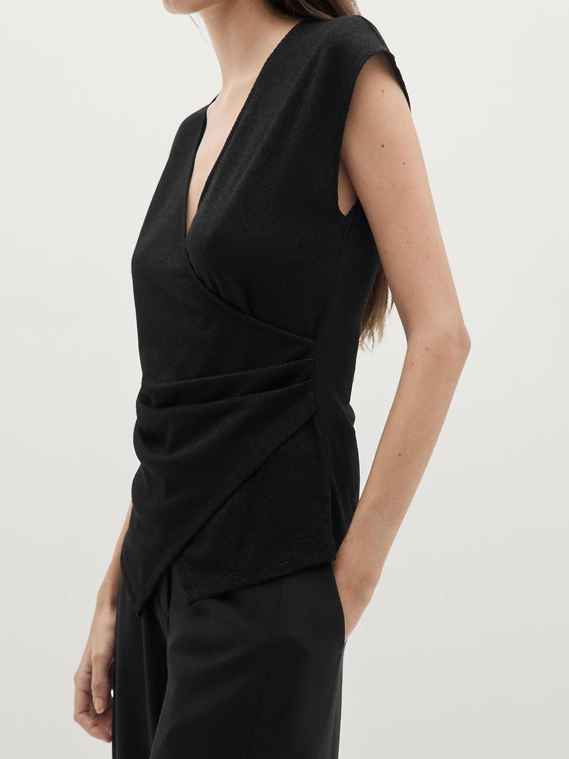 Metallic finish top with surplice neckline