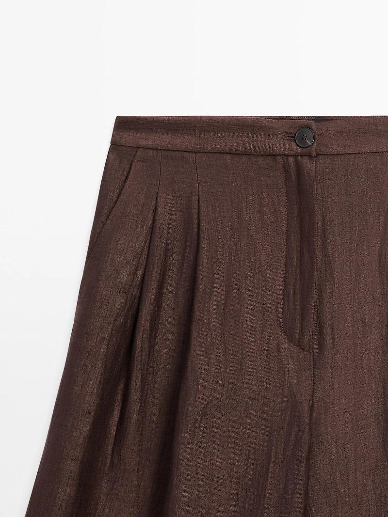 Wide-leg mid-rise crinkle trousers