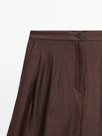 Wide-leg mid-rise crinkle trousers