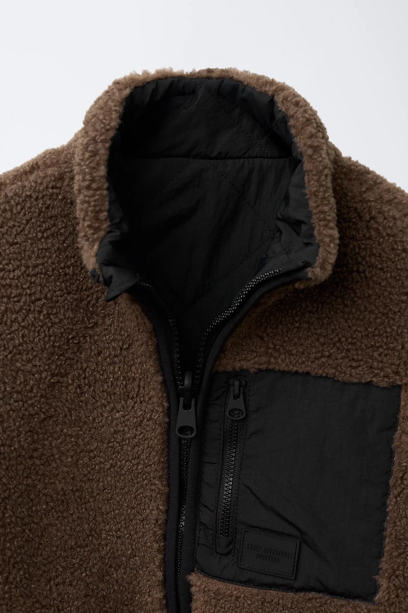 REVERSIBLE FLEECE VEST