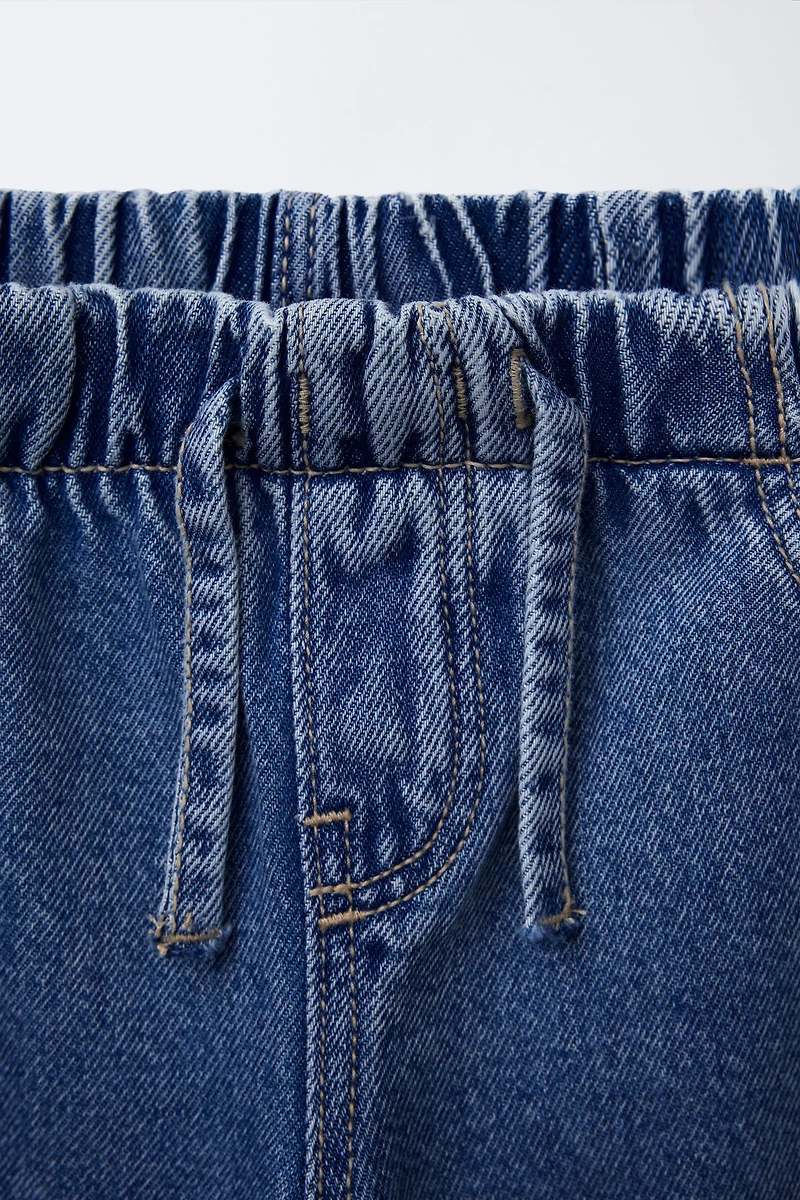 FLUID RIPPED WIDE LEG JEANS