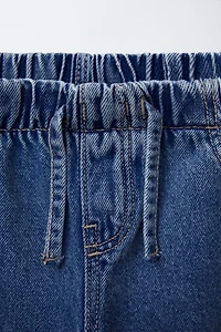 FLUID RIPPED WIDE LEG JEANS