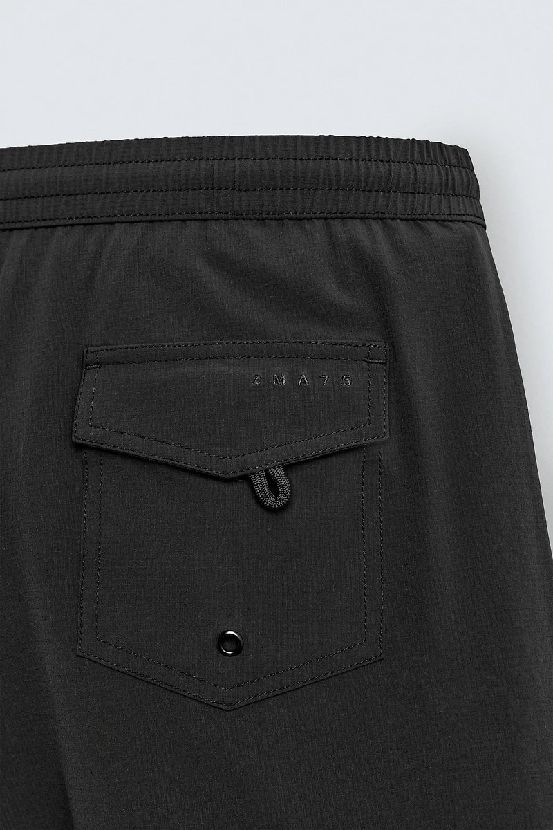 SHORT STRUCTURED SWIMSUIT