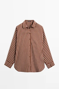 Flowing striped shirt with batwing sleeves