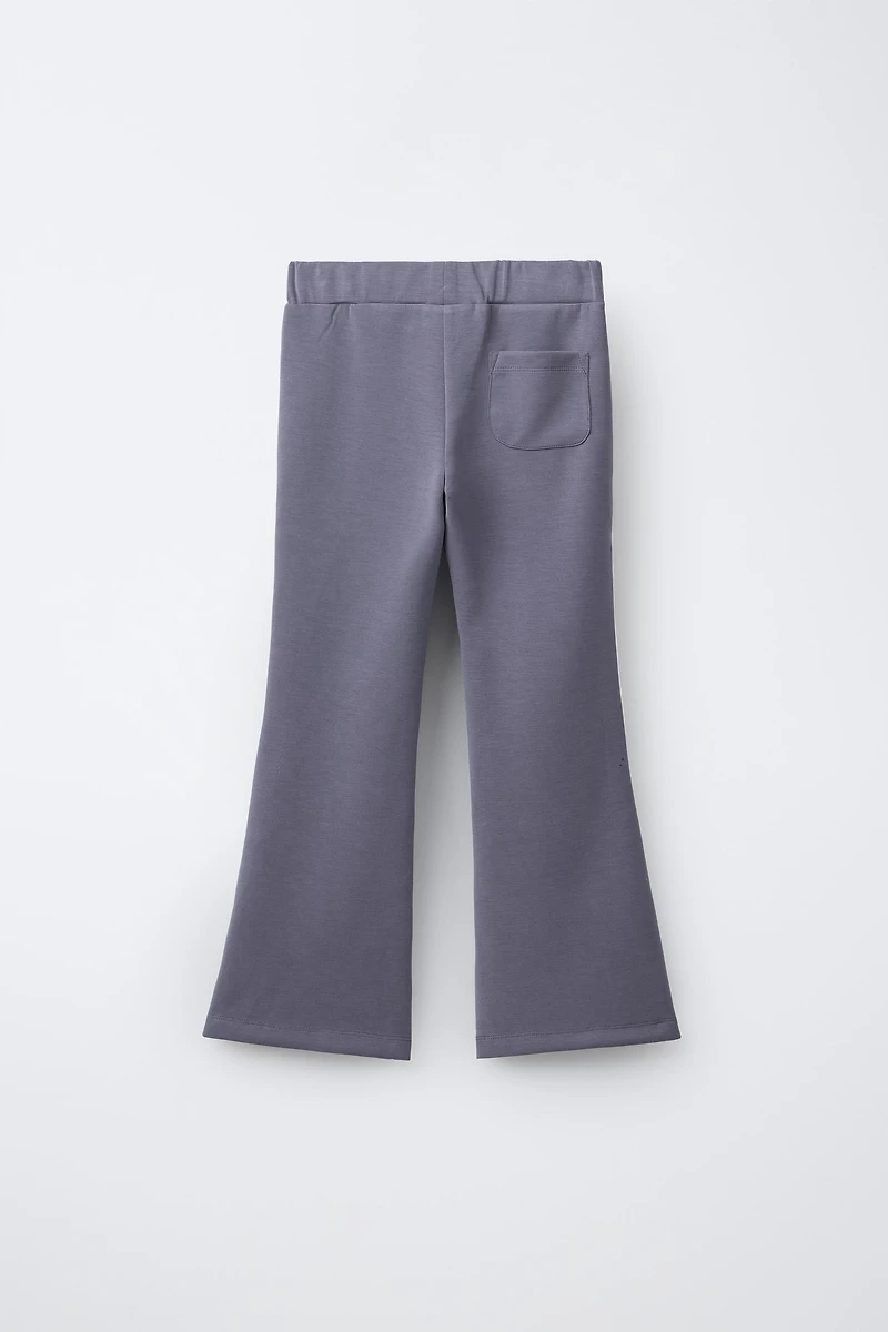 FLARE PANTS WITH CONTRAST STRIPES AND MODAL