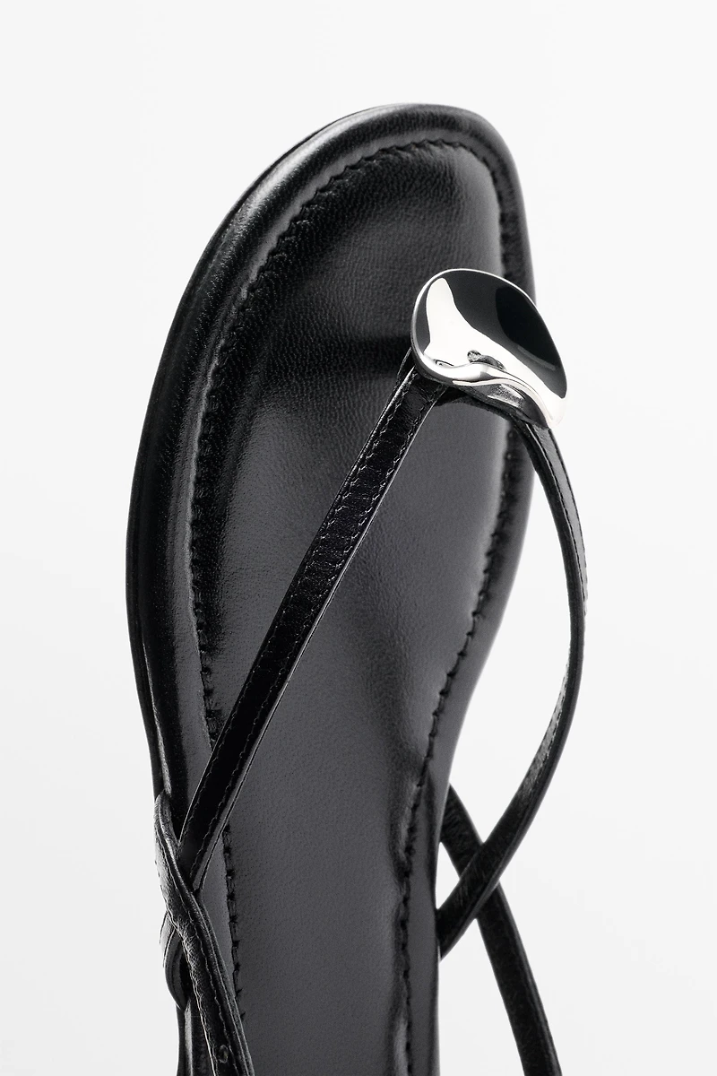 Flat slider sandals with gem detail