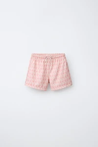 AGES 6-14 / PALM TREE SWIM SHORTS