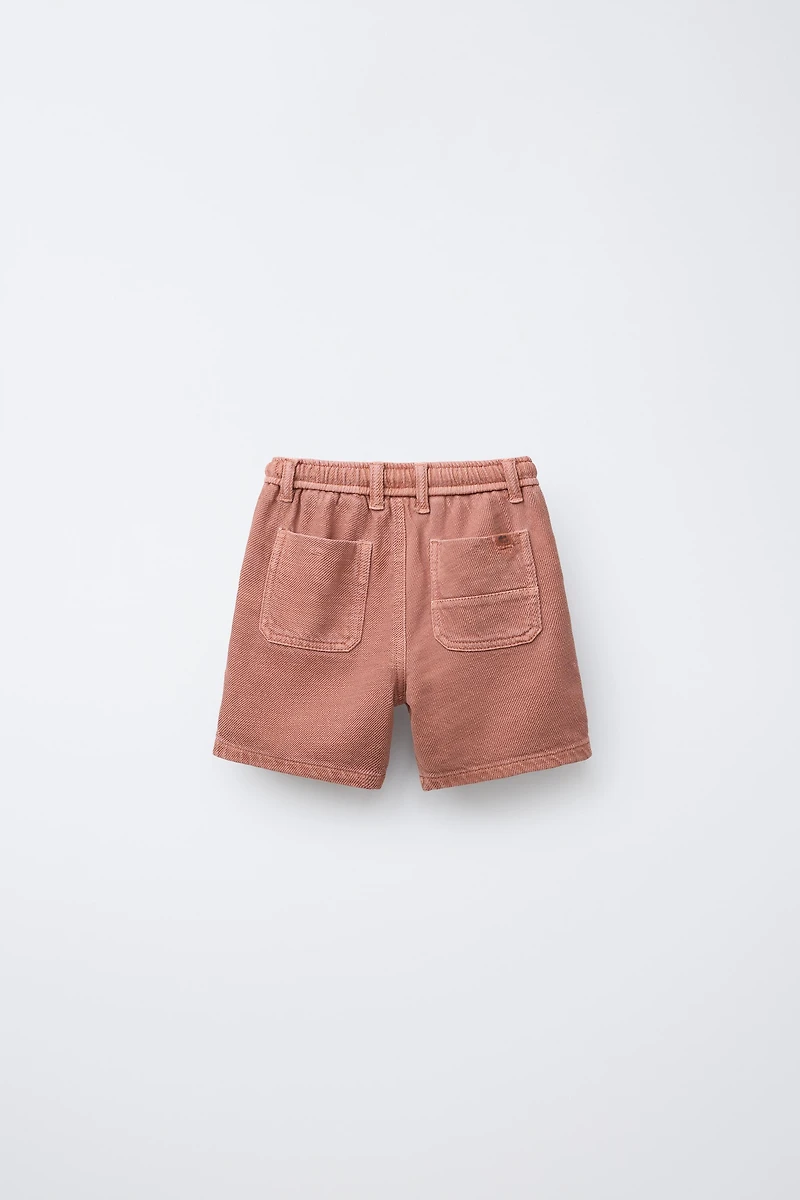 BERMUDA STANDARD TOUCHER DOUX