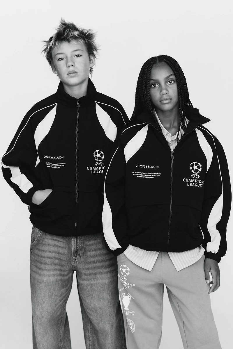 UEFA CHAMPIONS LEAGUE ® WATER REPELLENT JACKET WITH HOODIE