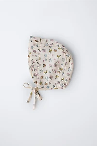 FLORAL TEXTURED RUFFLED BONNET