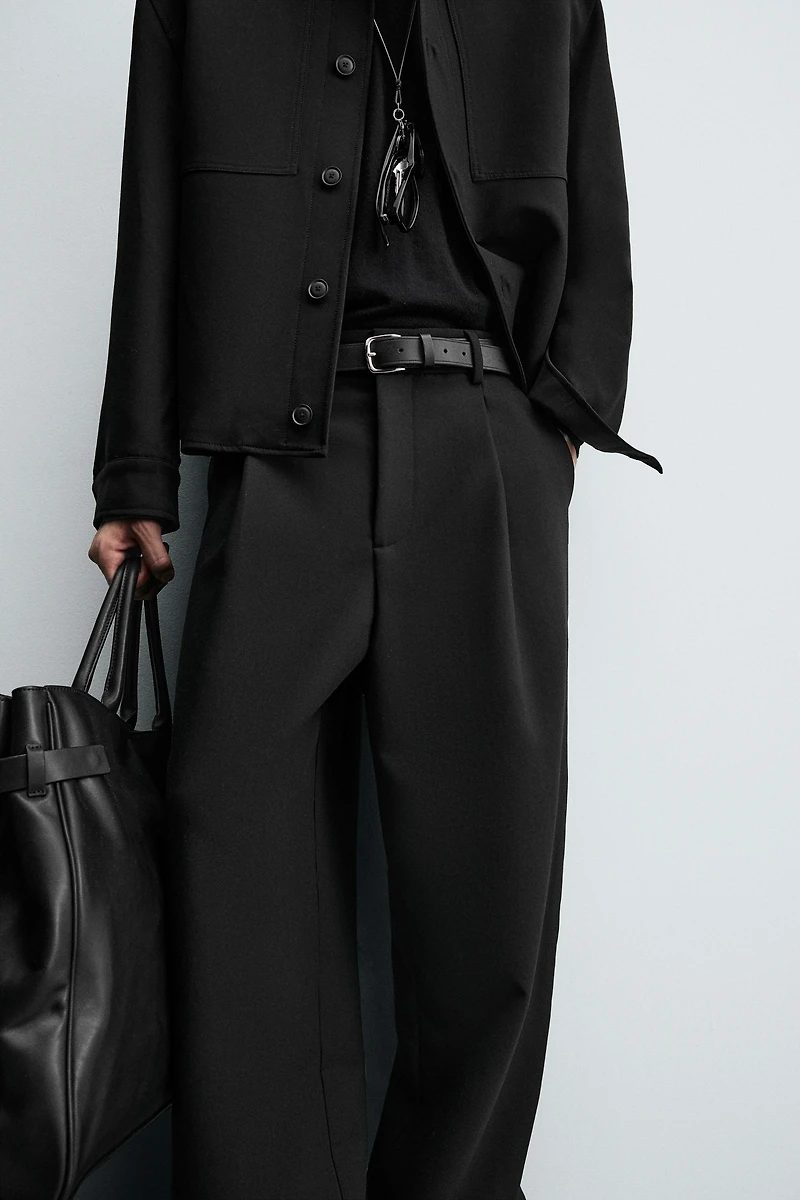 RELAXED FIT PLEATED PANTS