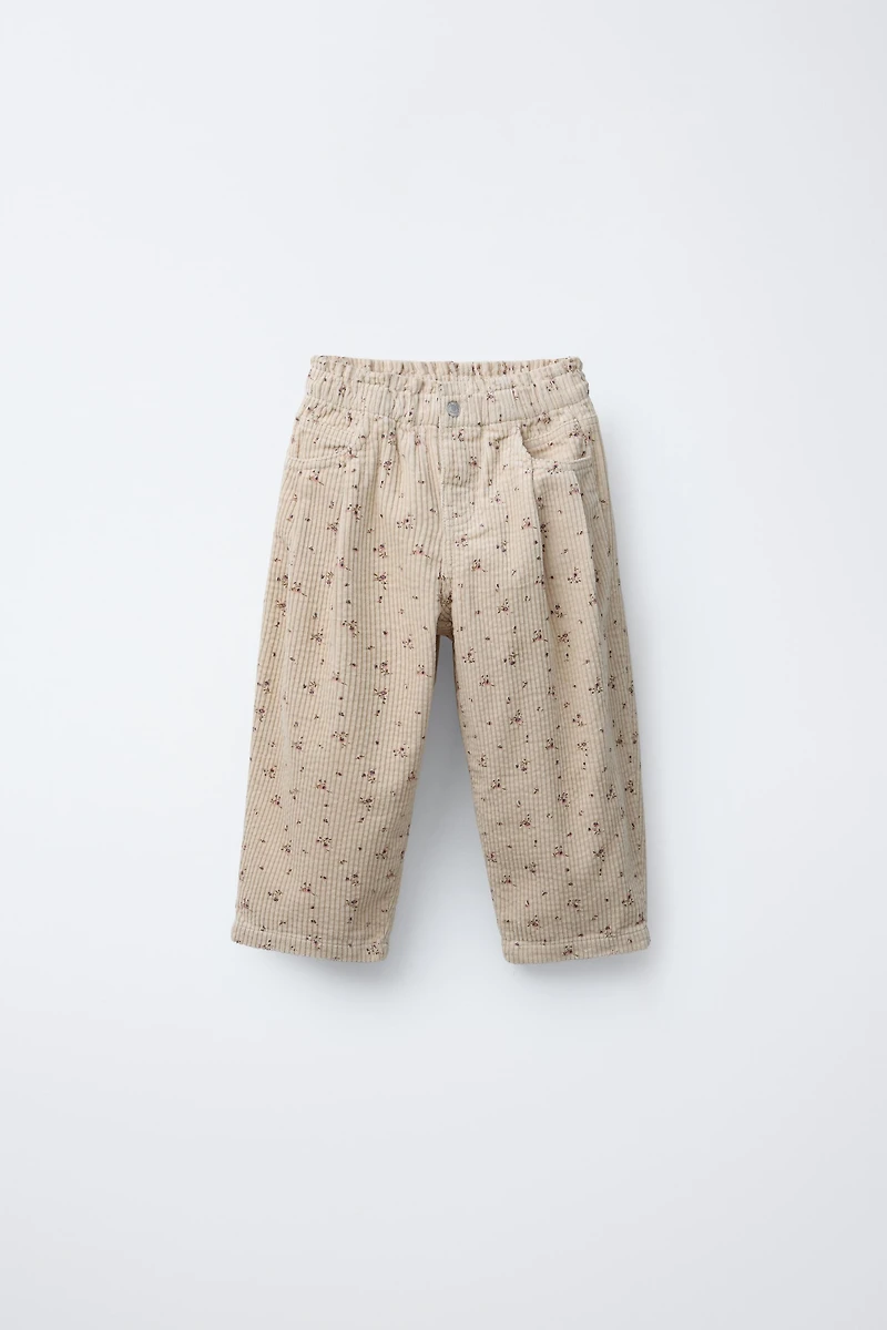 PANTALON EN VELOURS CÔTELÉ À FLEURS