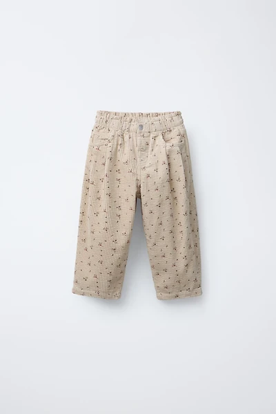 PANTALON EN VELOURS CÔTELÉ À FLEURS