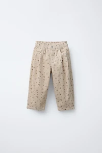 PANTALON EN VELOURS CÔTELÉ À FLEURS