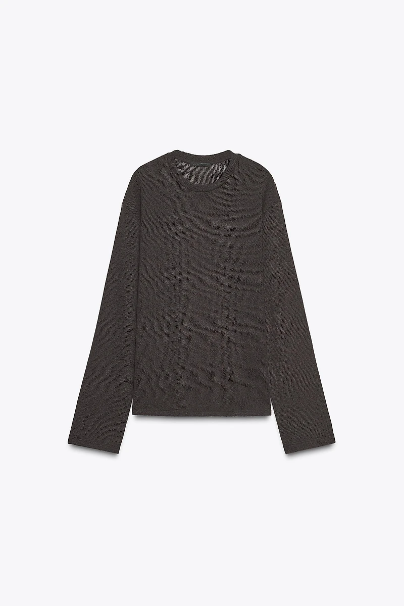 TOP EN MAILLE AJOURÉ