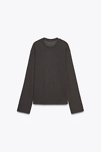 TOP EN MAILLE AJOURÉ