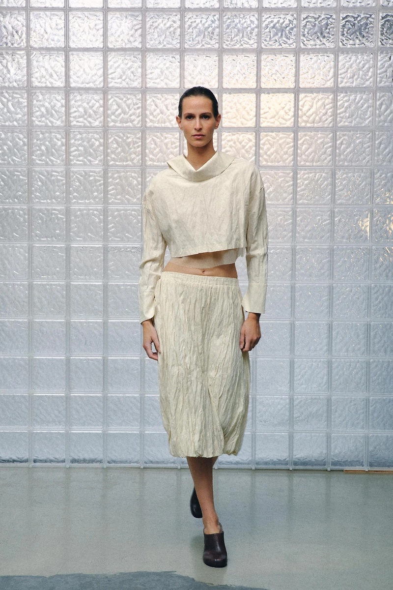 WRINKLED KNIT MIDI SKIRT