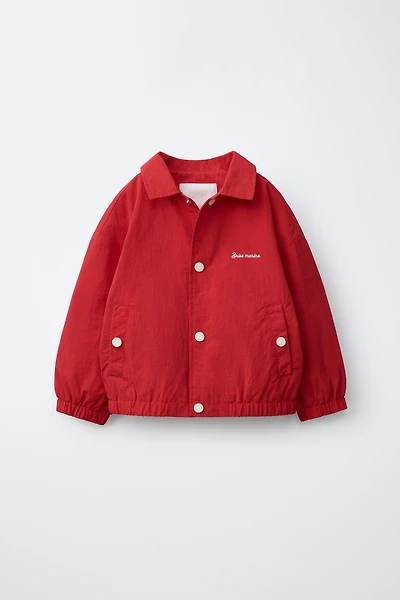 LIGHTWEIGHT EMBROIDERED TEXT WATER REPELLENT RAINCOAT