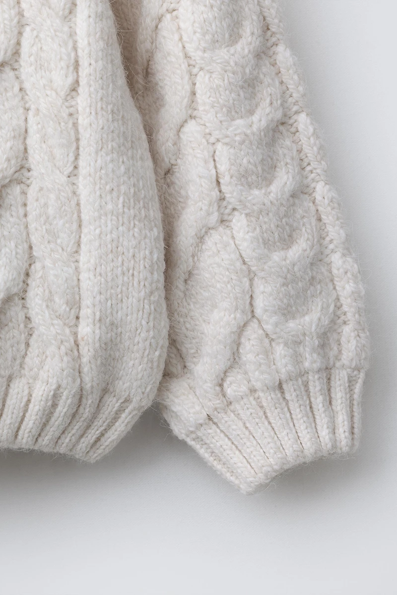 CABLE KNIT SWEATER