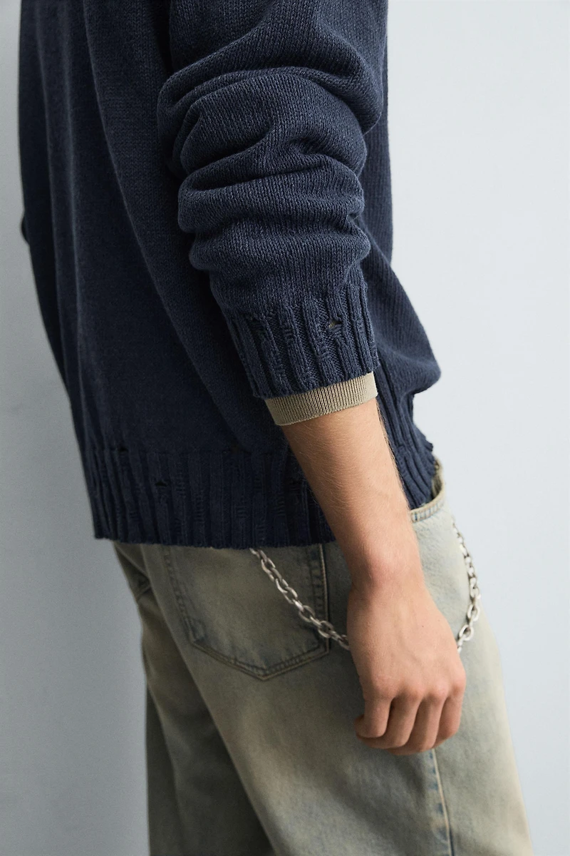 DISTRESSED KNIT POLO